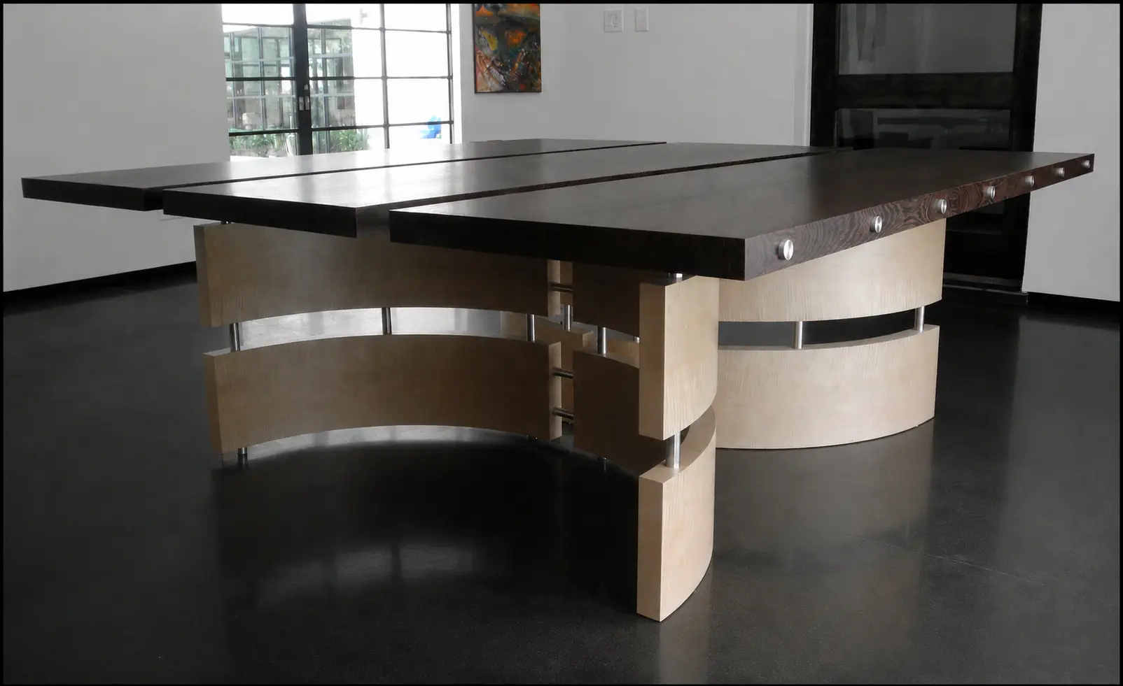 Large dark wenge dining table with sculptural base